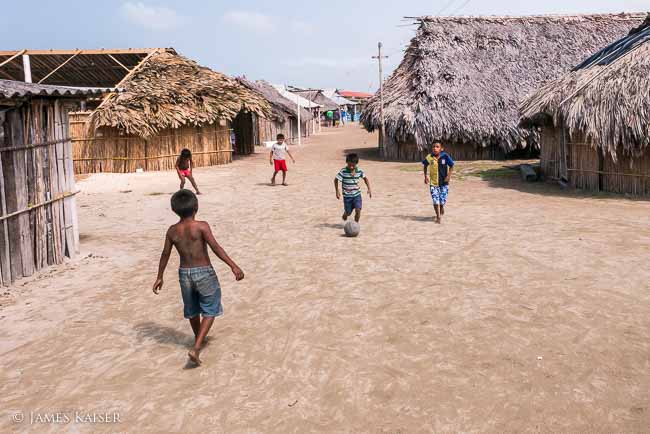 Kuna children playing soccer, Isla Tigre