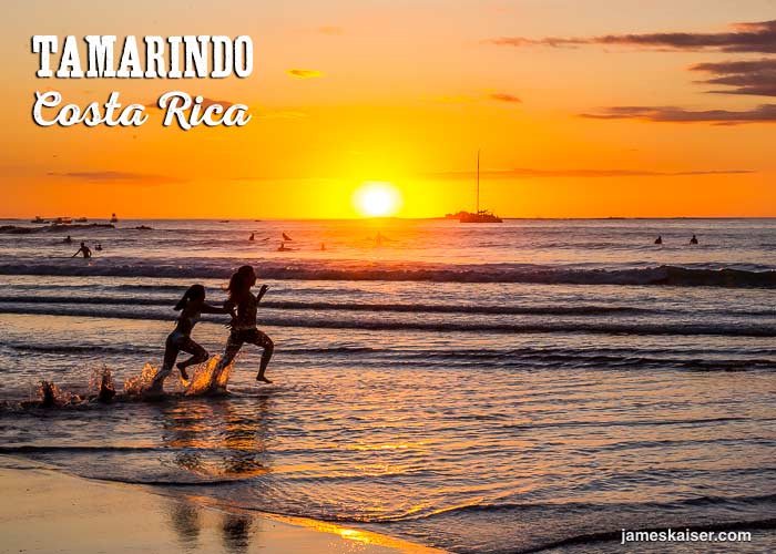 Girls playing in waves at sunset, Tamarindo, Costa RIca